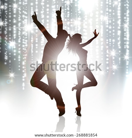 Silhouettes of people dancing on a sparkle background