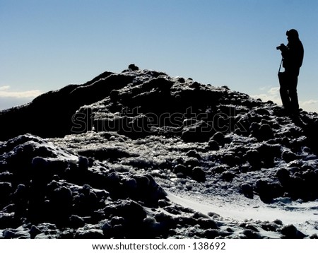 Photographer on Icy Hill  (Silhouette),