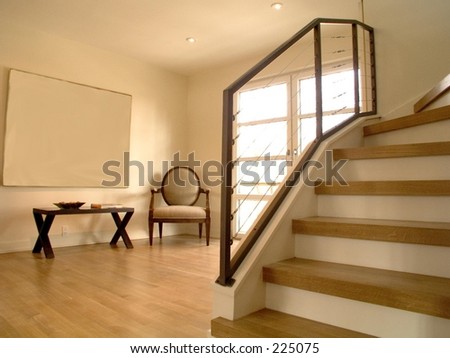 Alcove and stairs leading to upper levels.