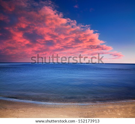 A Sparse And Minimalistic Image Of A Blazing Sunset Over The Calm Waters Of Lake Erie Near Vermilion Ohio, USA