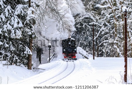 Winter snow forest train ride scene. Winter train ride view. Train ride in winter snow forest. Winter train snowy forest