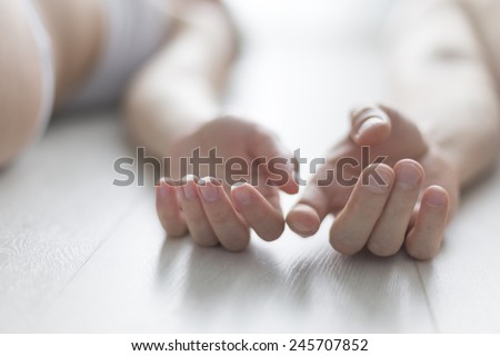 the gentle touch of hands couple in love, which lies on the floor naked