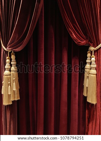 Texture of velvet fabric. Red velvet background curtains. Opera concept