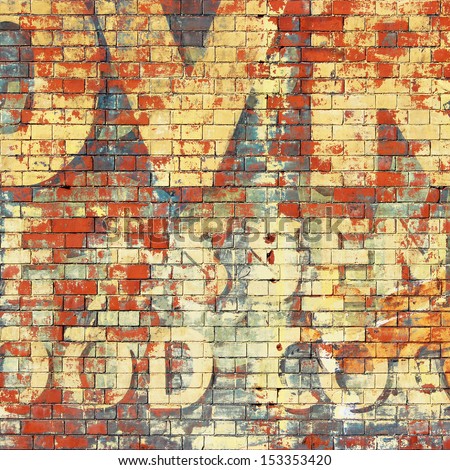An Old Grunge Red Brick Wall with Painted Letters