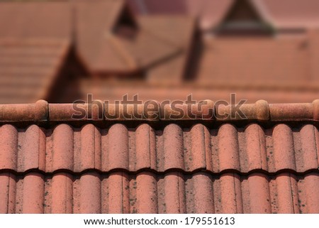 A Roof Top with Red Tiles