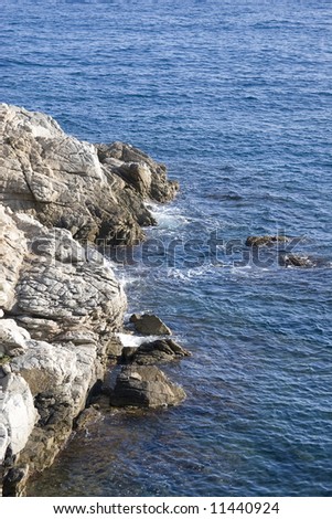 Spain, Lloret de Mar, landscape with rocks and waves.