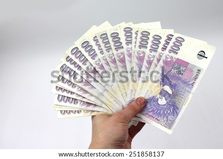 Czech money in hand, thousands