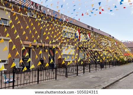 HELMOND, THE NETHERLANDS - JUNE 8: Soccer fans have put up street decorations for the European Soccer Championships 2012 in Helmond, The Netherlands on June 8, 2012.