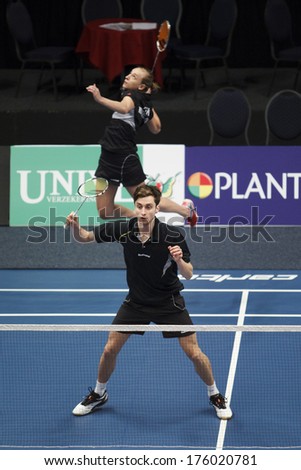 ALMERE - FEBRUARY 1: Jacco Arends (front) and Selena Piek (back) reach the semi finals in the National Championships badminton 2014 in Almere, The Netherlands on February 1, 2014.