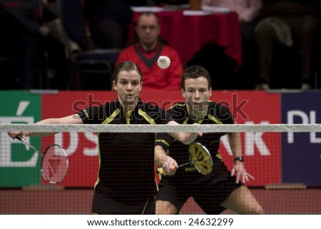 ALMERE, NETHERLANDS - FEBRUARY 1: Top badminton players Ilse Vaessen and Jorrit de Ruiter in their mixed doubles match at the Dutch Badminton Championships February 1, 2009 in Almere, Netherlands.
