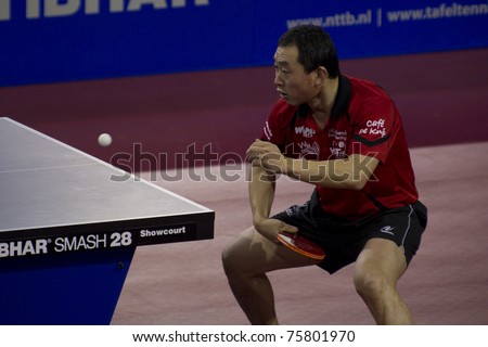 EINDHOVEN - MARCH 6: Martijn de Vries beats Liu Qiang (pictured) in the finals of the Dutch Table Tennis Championships in Eindhoven on March 6, 2011.