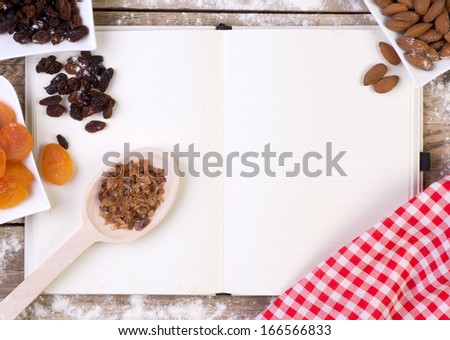 Blank recipe book with cake ingredients