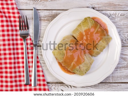 Traditional polish dish - golabki. Cabbage leaves stuffed with minced  meat and rice