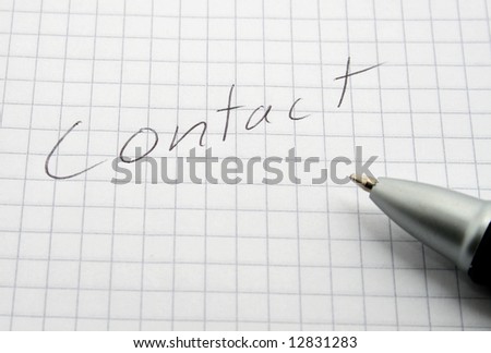 writing pad with contact written on it
