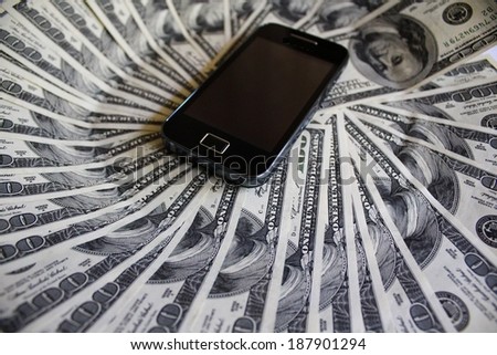 Mobile phone and banknotes