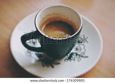 a macro cup of fresh morning espresso coffee
