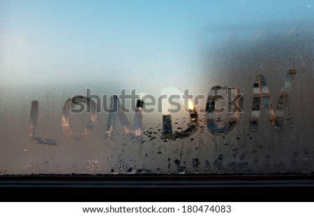 word London written on the wet window