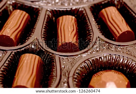 Box of chocolates isolated on white background