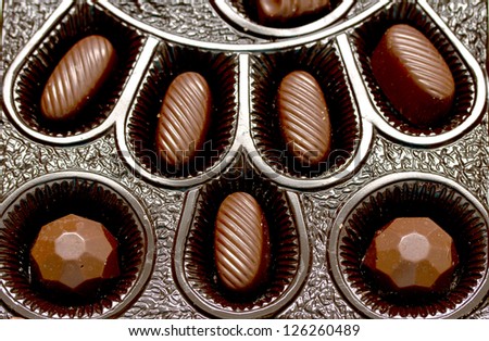 Box of chocolates isolated on white background