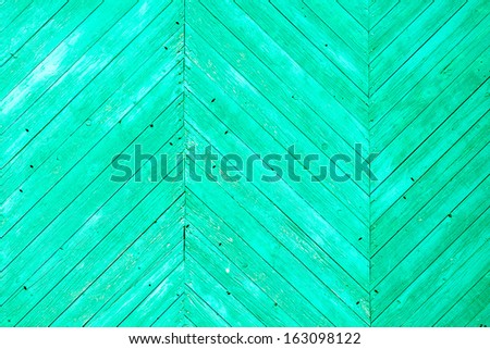 Background picture made of old green wood boards