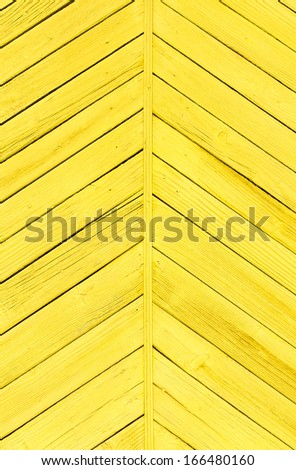 planks of wood painted bright yellow