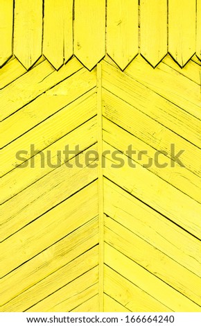 planks of wood painted bright yellow