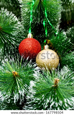 artificial green Christmas tree with round balls, great christmas background