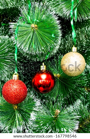 artificial green Christmas tree with round balls, great christmas background