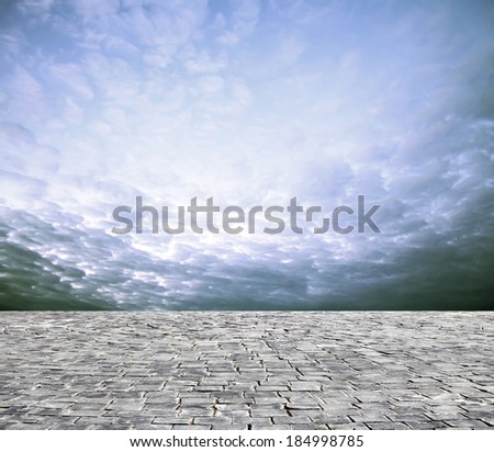 background with cobbled streets and sky