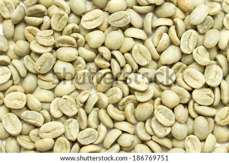 green coffee beans on white background - coffee beans