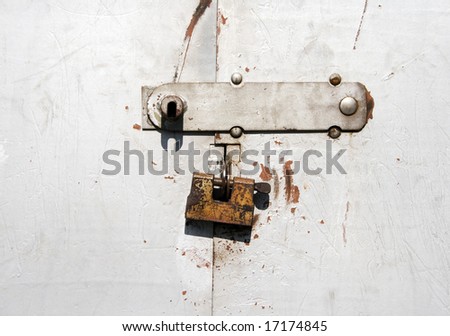The iron door on all background is closed on the trailing lock