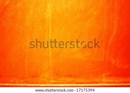 The painted wooden panel by an orange paint on all background.