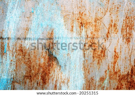 Plate of metal rusty on all background, with old layers of a paint