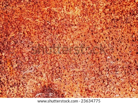 An image of some rusty metal up close that has been ripped up.