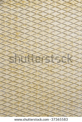 Rusty metal texture or background with diamond pattern