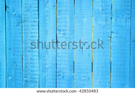 Wooden protection on all background, is painted light blue.