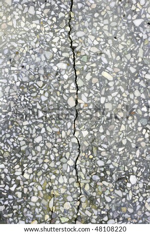 Grunge cement background with crack