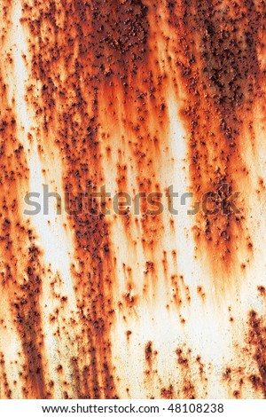 red metallic surface with spots