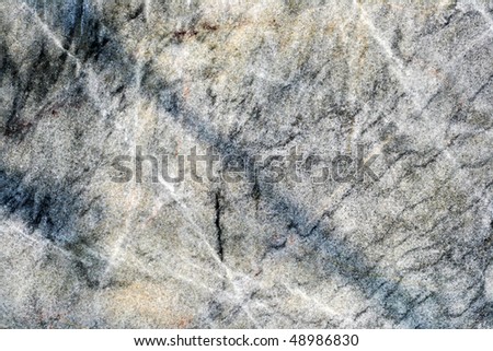 White and black granite marble texture closeup.