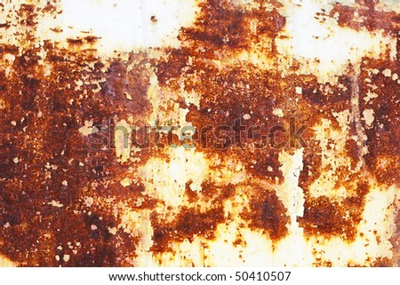 Plate of metal rusty on all background, with traces of a paint