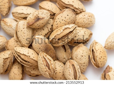 almond fruits on a white background