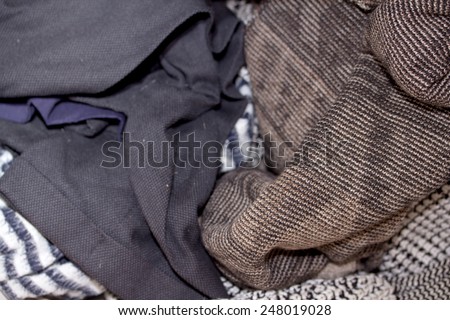 pile of old clothing items