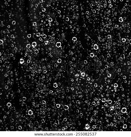 water drops on black background, seamless texture