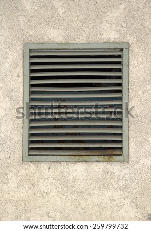 concrete wall with metal bars