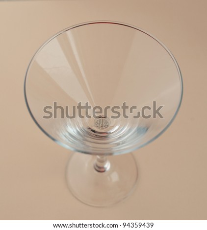 Empty glass on paper background. one object