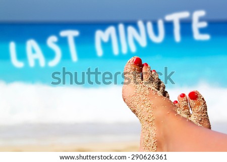 Legs on the beach as concept for last minute offer