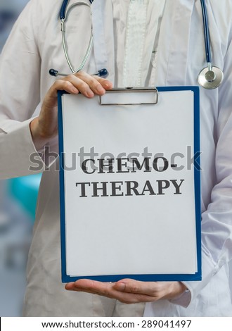 Doctor holds clipboard and advices chemotherapy treatment of cancer
