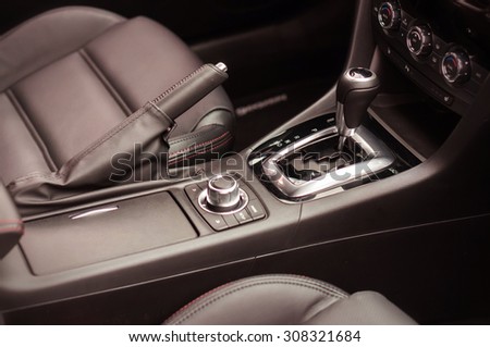 Black interior inside car - gear and shift lever