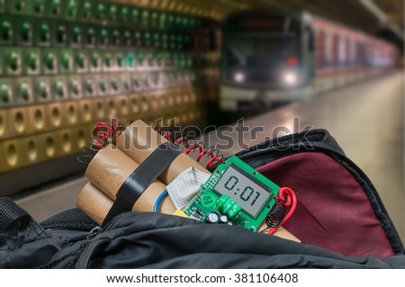 Train in subway station and bomb in bag is going to detonate. Terrorism concept.
