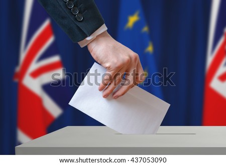Referendum in Great Britain (Brexit) about relationship with European Union. Voter holds envelope in hand above ballot.